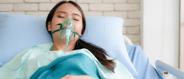 woman is having medical oxygen treatment due to hypoxia